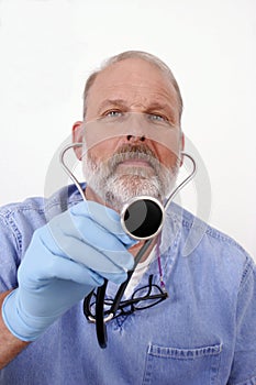 Doctor using stethoscope