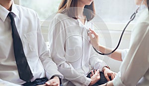 Doctor is using a stethoscope for patients patient examination.