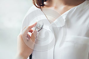 Doctor is using a stethoscope for patients patient examination.