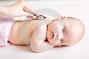 Doctor Using A Stethoscope To Listen To Baby`s back , Baby Health Concep