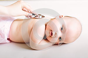 Doctor Using A Stethoscope To Listen To Baby`s back , Baby Health Concep