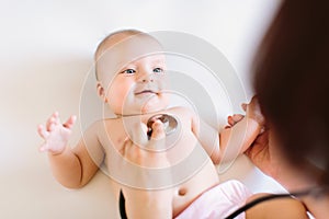 Doctor Using A Stethoscope To Listen To Baby`s Chest , Baby Health Concep