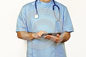 Doctor using a tablet PC, isolated