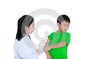 Doctor vaccinating boy`s arm. Asian boy worry about vaccine syri