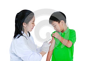 Doctor vaccinating boy`s arm. Asian boy worry about vaccine syri