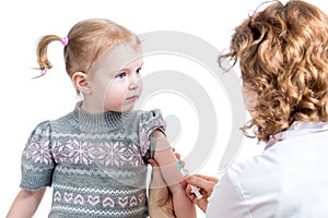 Doctor vaccinating child girl isolated