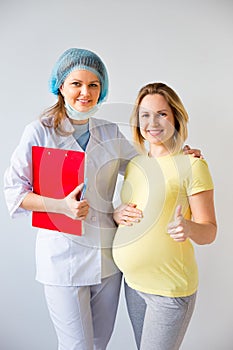 Doctor vaccinating a pregnant woman