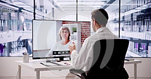 Doctor In Video Conference Call