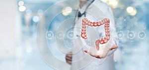 Doctor on a virtual screen shows the digestive system