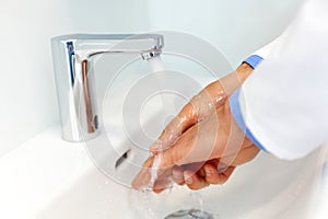 Doctor Washes Hands Before Medical Work. Dental Clinic