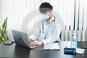 Doctor wear face mask comforting Working care, helping, encourage and empathy at nursing hospital ward After Corona virus epidemic