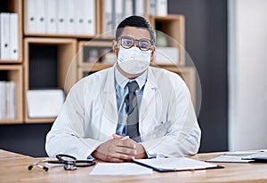 Doctor wearing covid mask in clinic to prevent spread of pandemic virus, disease or illness in hospital consult