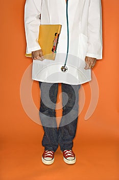 Doctor wearing jeans and sneakers.