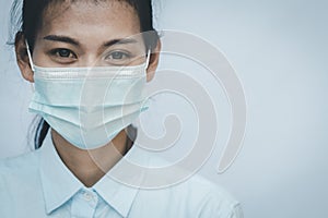 Doctor wearing protection face mask against coronavirus. Corona virus outbreaking. Epidemic virus Respiratory Syndrome. Covid 19 photo