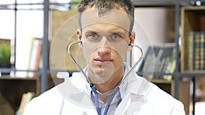 Doctor Wearing stethoscope in ears, Ready to Check Patient