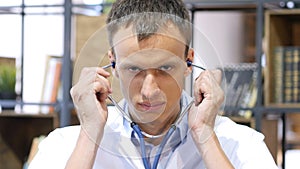 Doctor Wearing stethoscope in ears, Ready to Check Patient