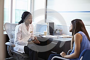 Doctor Wearing White Coat Meeting With Female Patient