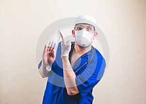 Doctor with white glowes on hands