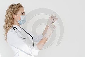 Doctor in white uniform against white background