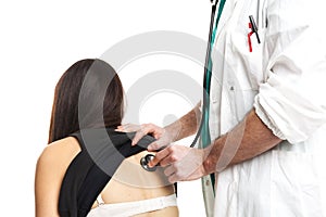 Doctor with white uniform do back auscultation with stethoscope. horizontal cut. Caucasian. photo