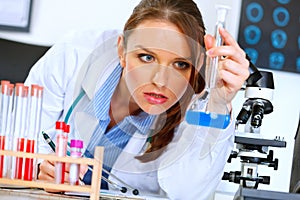 Doctor woman analyzing results of medical test