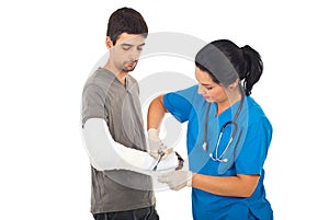 Doctor woman bandage injured hand man