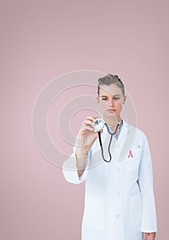 Doctor woman with breast cancer awareness ribbon