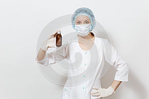 Doctor woman in face mask, sterile hat, gloves holding liquid medicine in bottle isolated on white background. Female