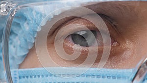 Doctor Woman Half Face, Eyes in Safety Glasses. Health Employee Looking the Camera. Portrait Medical Researcher Female