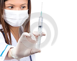 Doctor woman hand with syringe needle for injection