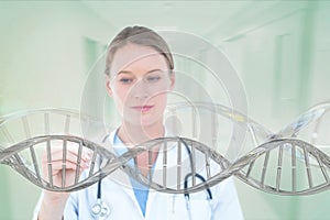 Doctor woman interacting with 3D DNA strand