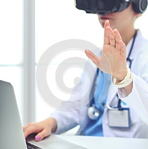 Doctor woman looking through phoropter during eye exam. Doctor woman