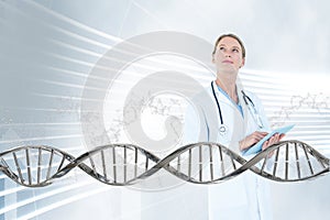 Doctor woman looking up with 3D DNA strand