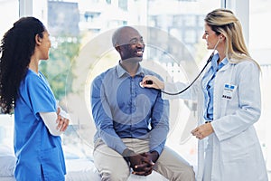 Doctor woman, patient and stethoscope at consultation in hospital for healthcare or health insurance. Black man and