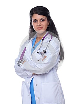 Doctor woman with stethoscope standing near wall