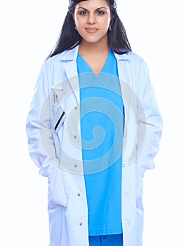 Doctor woman with stethoscope standing near wall