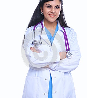 Doctor woman with stethoscope standing near wall