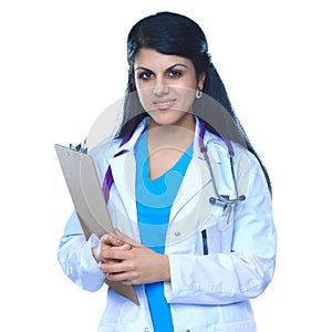 Doctor woman with stethoscope standing near wall