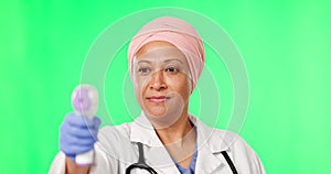 Doctor, woman and thermometer by green screen, face or check for healthcare, covid and mockup. Islamic female medic