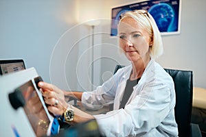 Doctor Woman Working In Hospital Office With Computer Technology Equipment