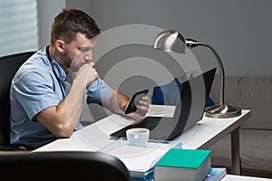 Doctor working at his office