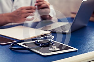 Doctor working in hospital office