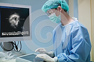 Doctor working at Intravascular ultrasound imaging