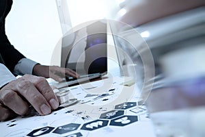 Doctor working with laptop computer in medical workspace office