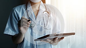 Doctor working with laptop computer in medical workspace office. doctor working on laptop computer in modern clinics office.