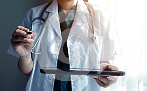 Doctor working with laptop computer in medical workspace office. doctor working on laptop computer in modern clinics office.