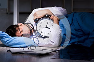 The doctor working night shift in hospital after long hours photo