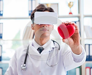 Doctor working with virtual VR reality glasses