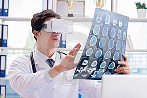 Doctor working with virtual VR reality glasses