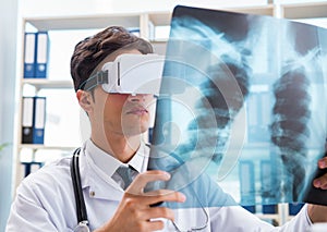 Doctor working with virtual VR reality glasses